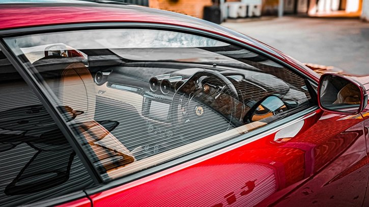 Professional Ferrari Sticky Button Repair